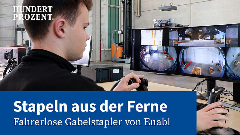 Das Bild zeigt einen Piloten, der aus der Ferne einen Gabelstapler steuert, und eine blaue Bauchbinde mit dem Titel des Videos.