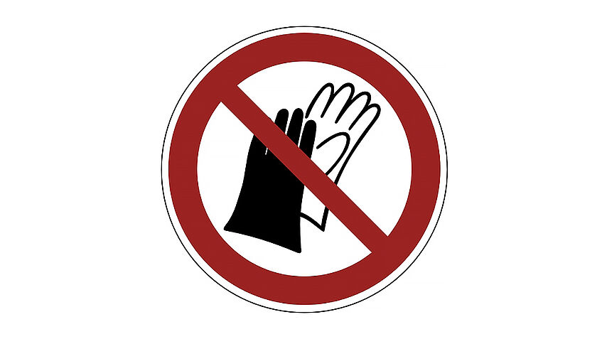 Verbotsschild, das signalisiert: Hier dürfen keine Schutzhandschuhe getragen werden.