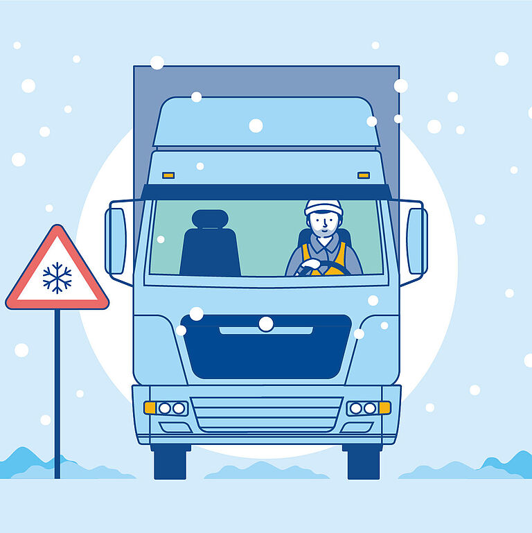 Lkw im Winter mit einem Frostwarnschild